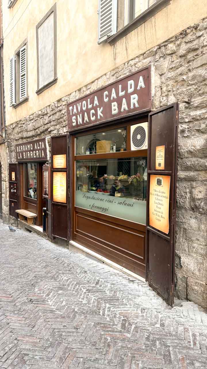 The exterior of Tavola Calda Snack Bar in Bergamo, Italy
