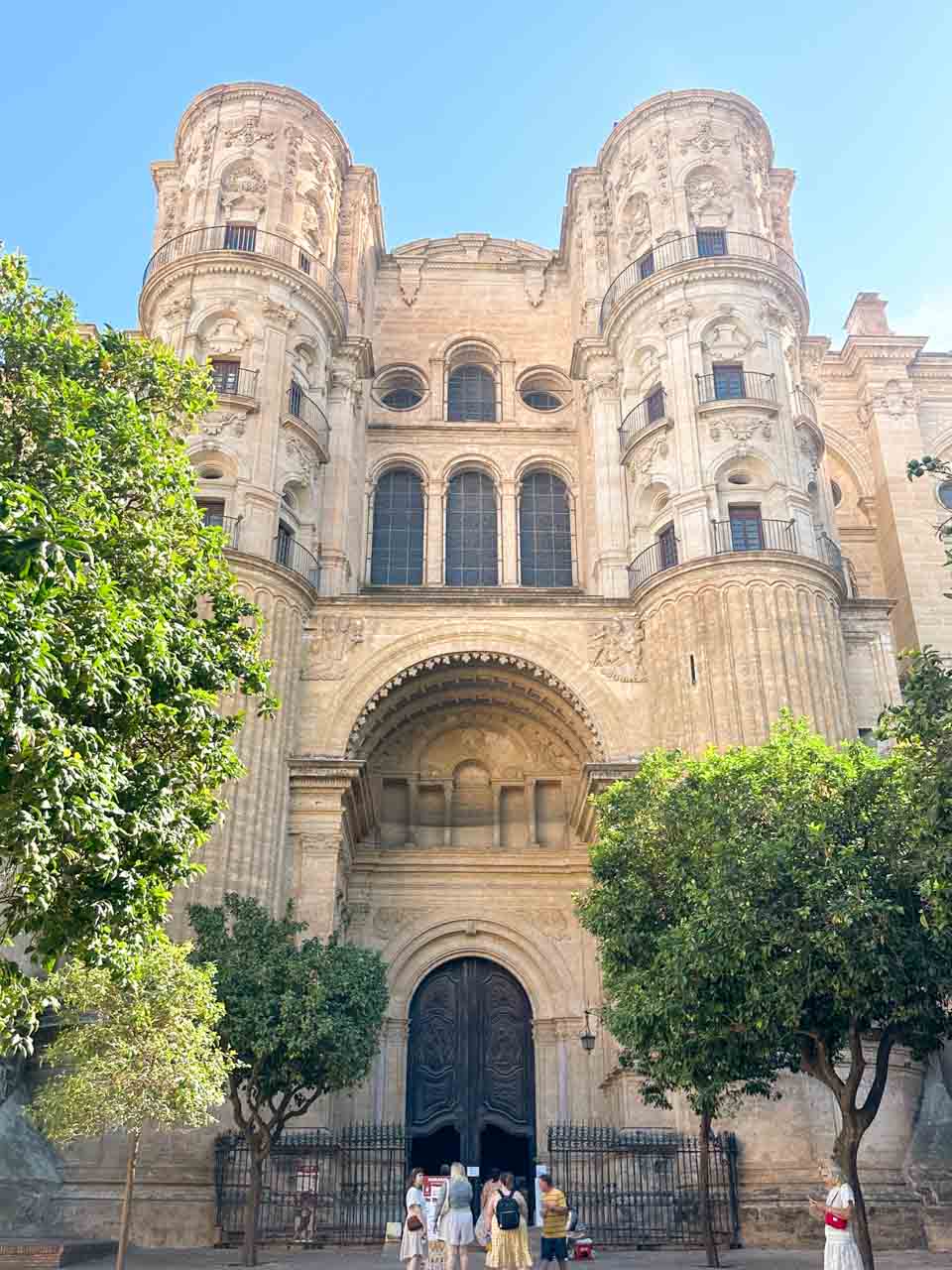 Visitors at the entrance to the Malaga Cathedral