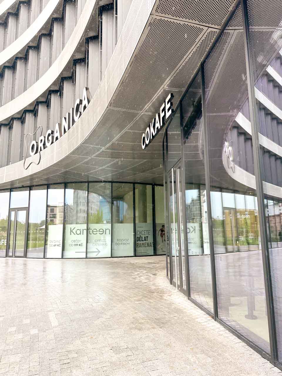 Entrance to the Cokafe cafe inside a modern building in Ostrava