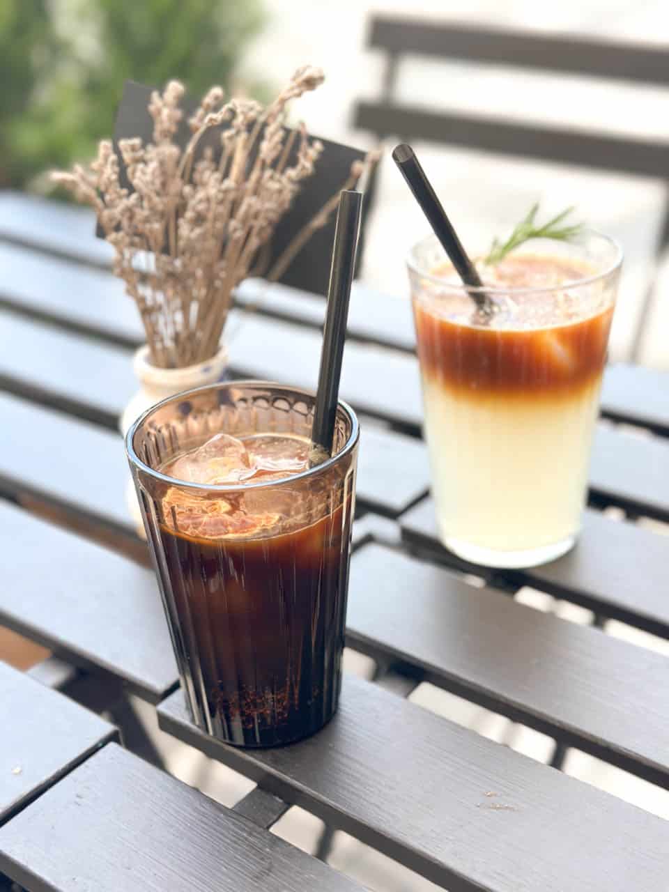 Two iced coffees on a cafe table outside U Černého stromu (Black Tree Cafe) in Ostrava, Czechia