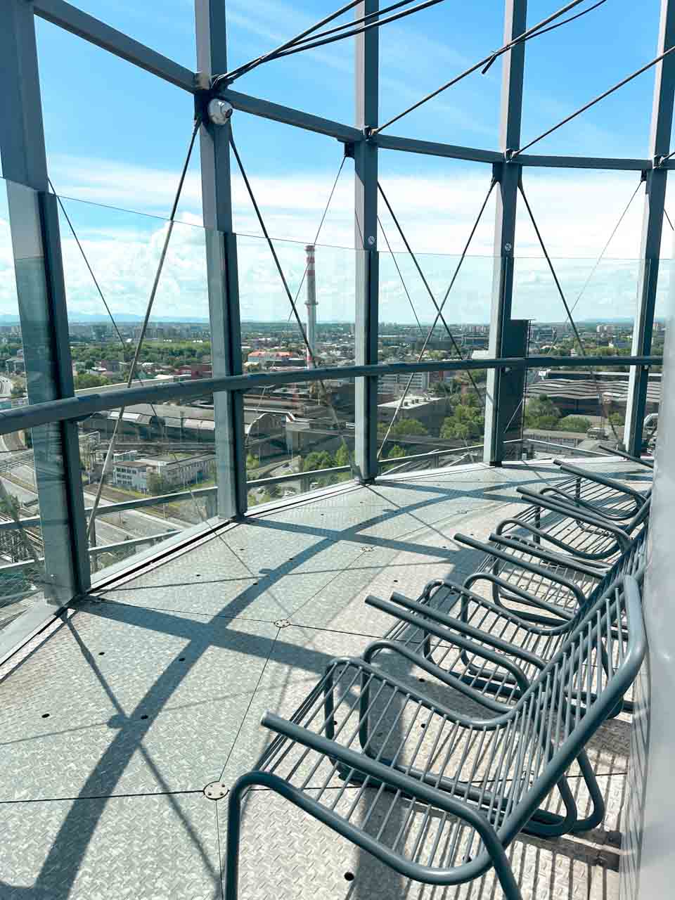 Observation deck with chairs on top of the Bolt Tower in Ostrava