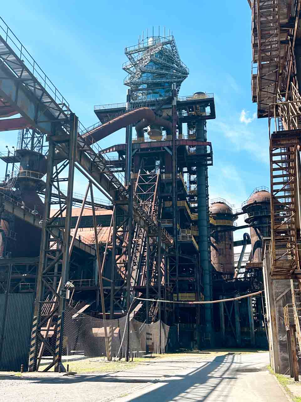 Complex industrial structures with pipes and towers inside the Dolní Vítkovice industrial complex