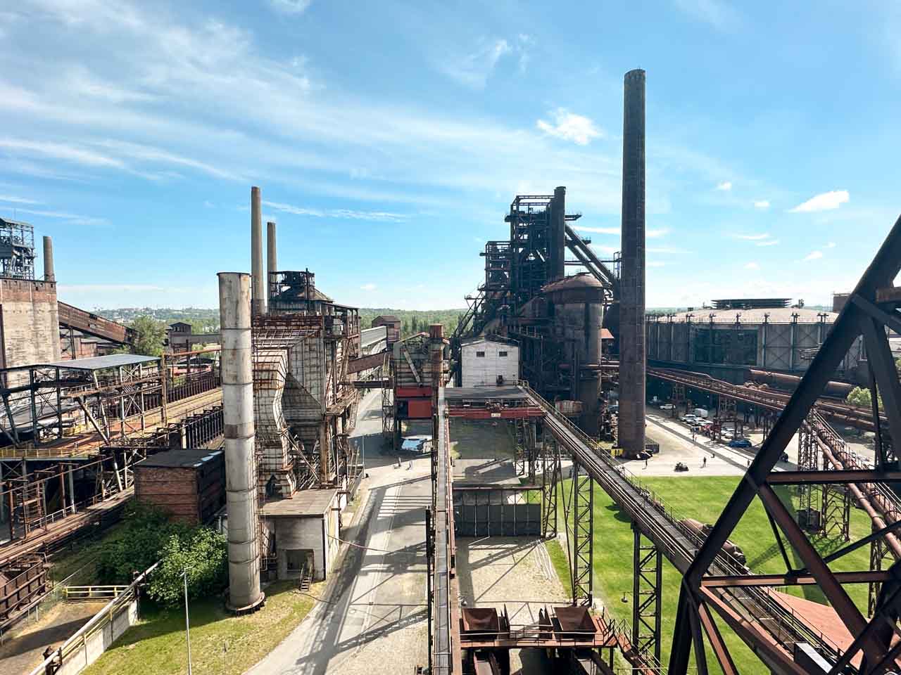 Wide view of the Dolní Vítkovice industrial complex under a clear sky seen from the top of Bolt Tower