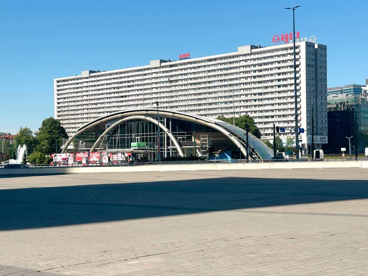 View of the Superjednostka building in Katowice with Jerzy Ziętek Square and the glass cupola of the underpass below