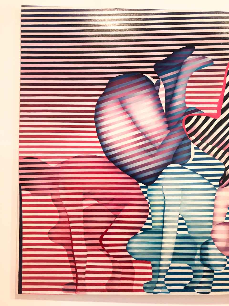 Colourful striped artwork with layered silhouettes of abstract human forms on display in Abbots' Palace in Gdańsk Oliwa