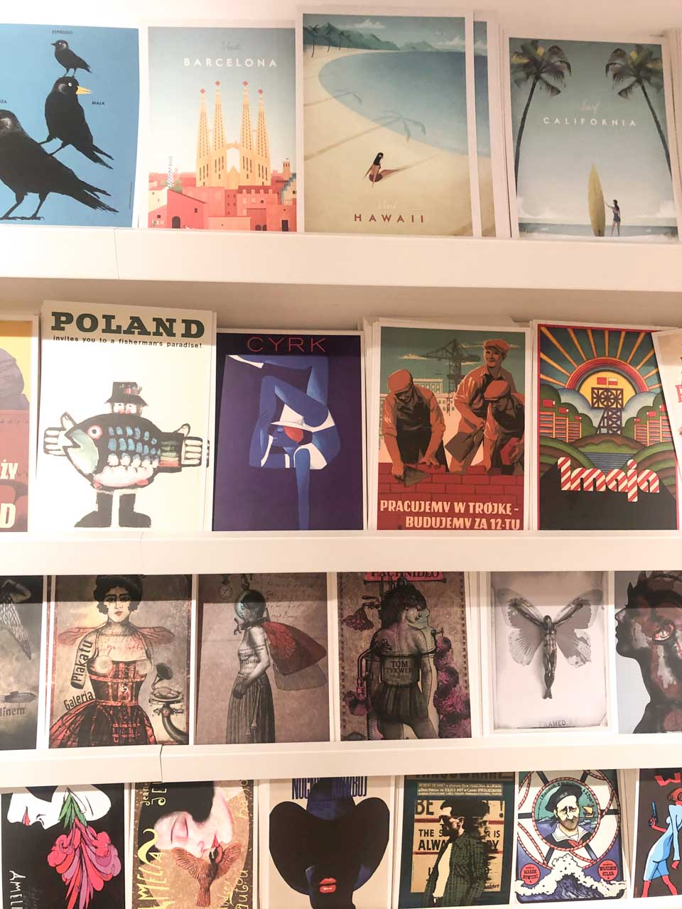 Rows of eye-catching travel and art posters on display inside Pańska Store in Gdańsk