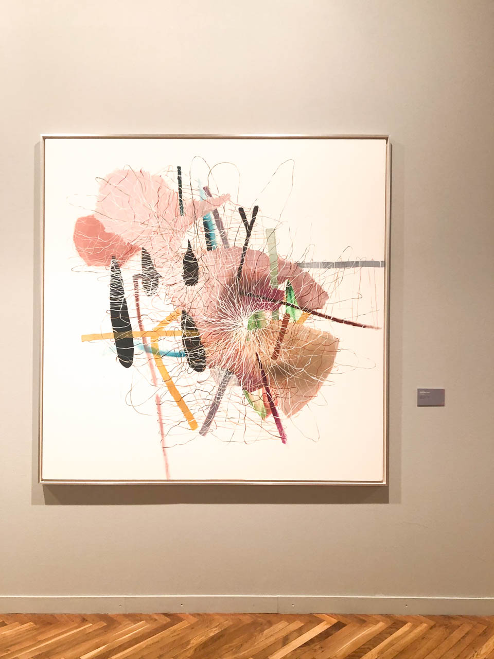 Abstract painting with colourful lines and textured shapes on display at the Abbots' Palace in Gdańsk Oliwa