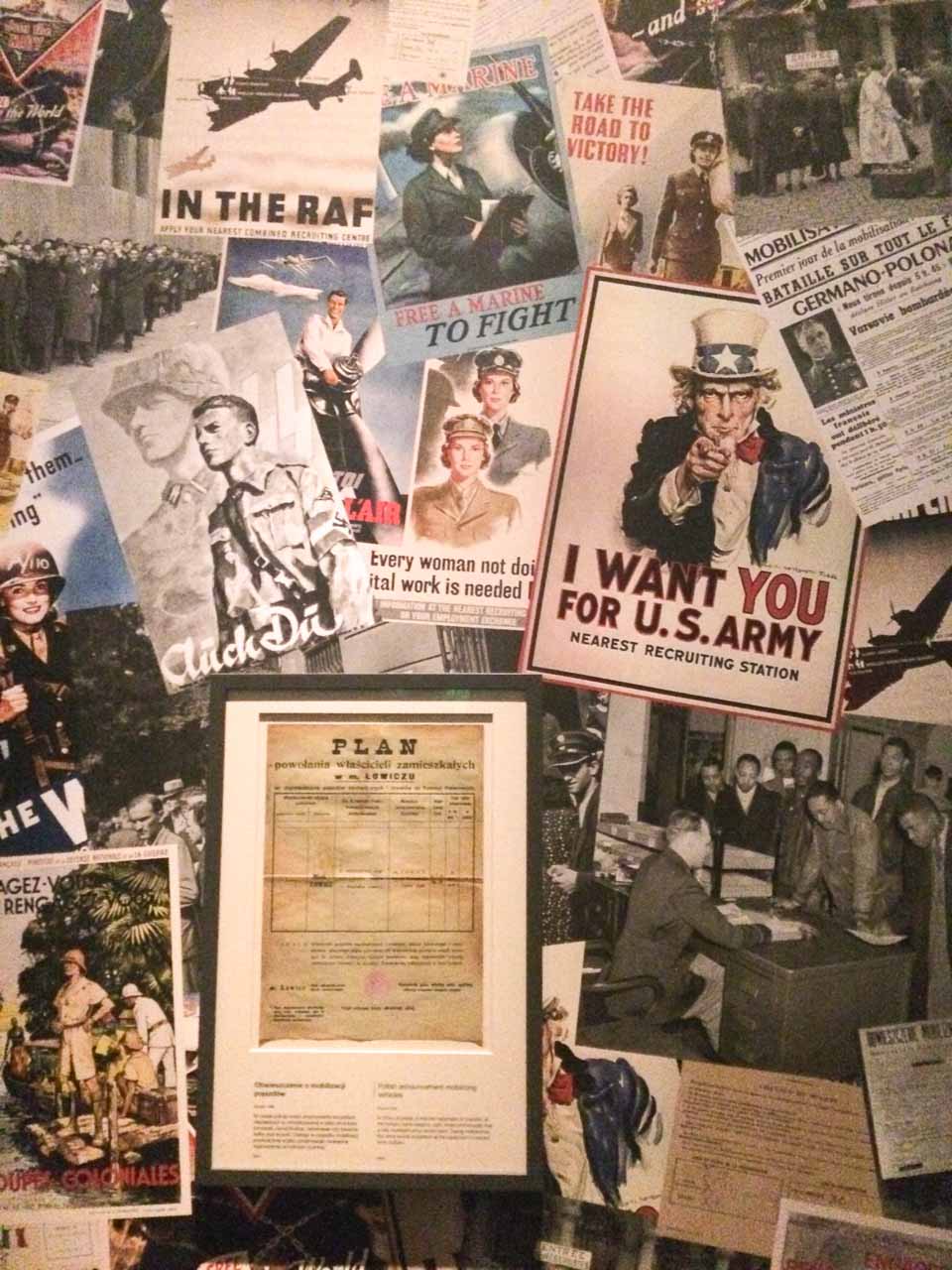 Wall covered with WWII-era posters and propaganda inside the Museum of the Second World War in Gdańsk