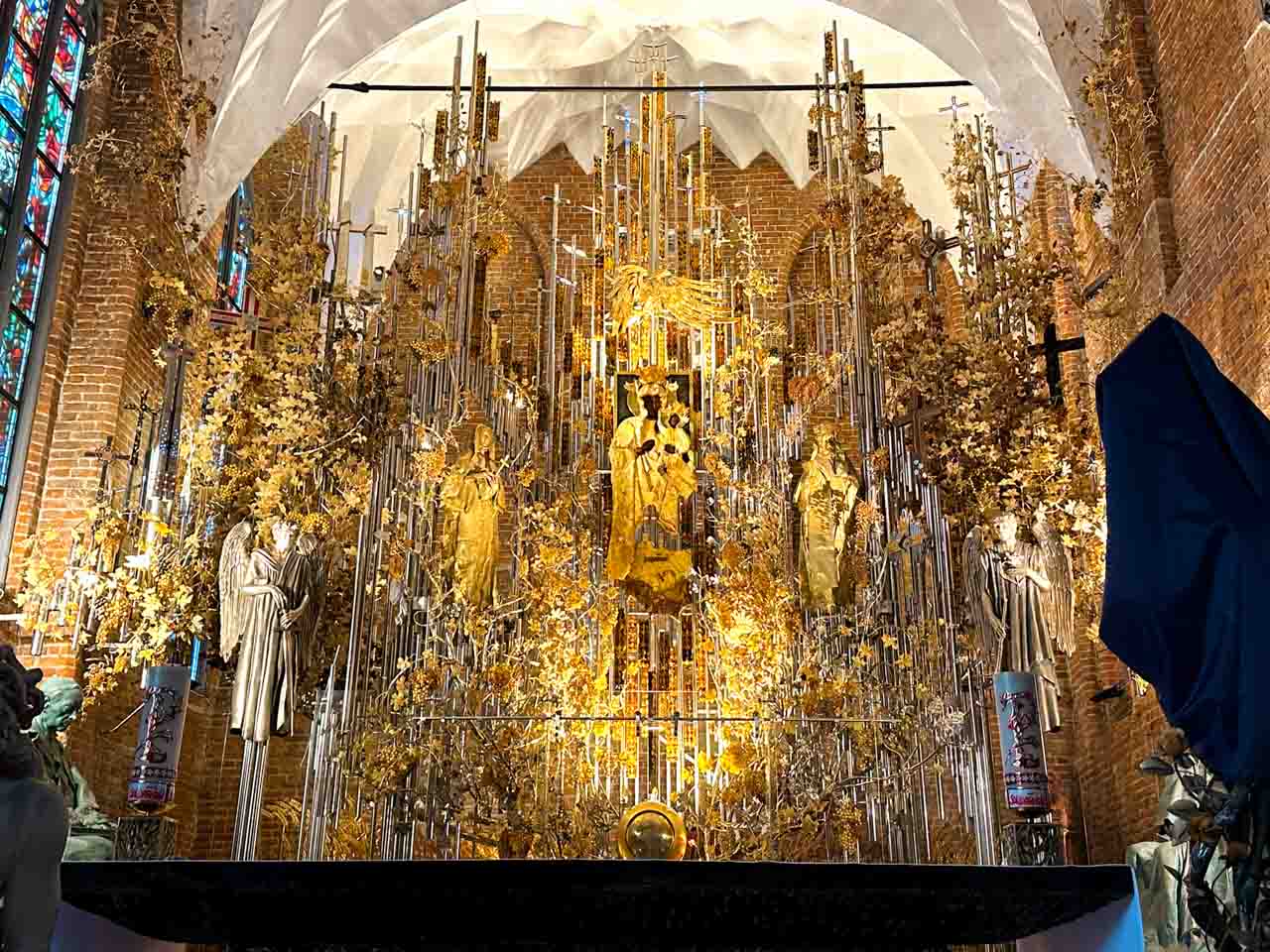 Close-up of the amber altar in St. Bridget’s Church, with intricate details and angel statues