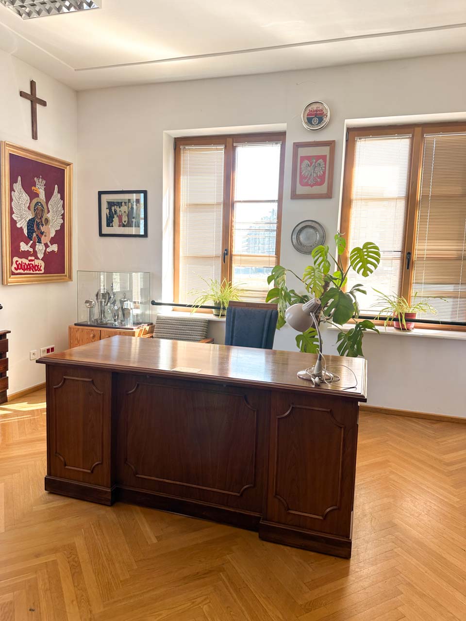 Lech Wałęsa’s former office with his wooden desk, Solidarity memorabilia, and Polish emblems on the wall