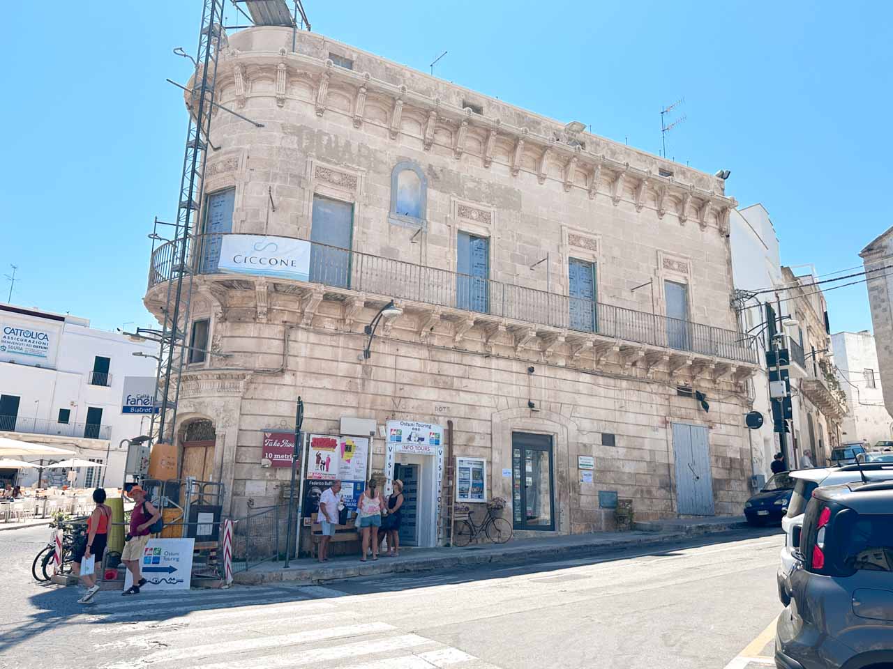 Historic corner building with balconies above Caff&egrave; Fanelli in Ostuni, Italy
