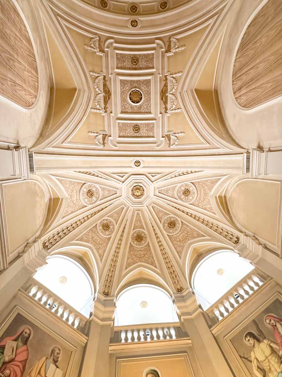 Ornate ceiling and dome inside the Church of Saints Cosmas and Damian in Alberobello, Italy