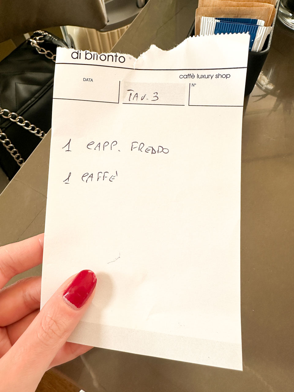 A handwritten caf&eacute; order for an iced cappuccino and an espresso at Di Bitonto in Matera