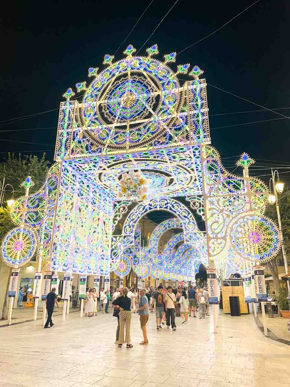 The Festa della Bruna illuminations lighting up Piazza Vittorio Veneto in Matera at night
