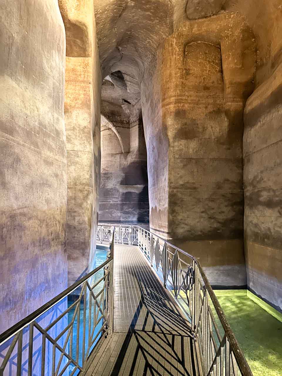The suspended walkway inside the Palombaro Lungo underground cistern in Matera