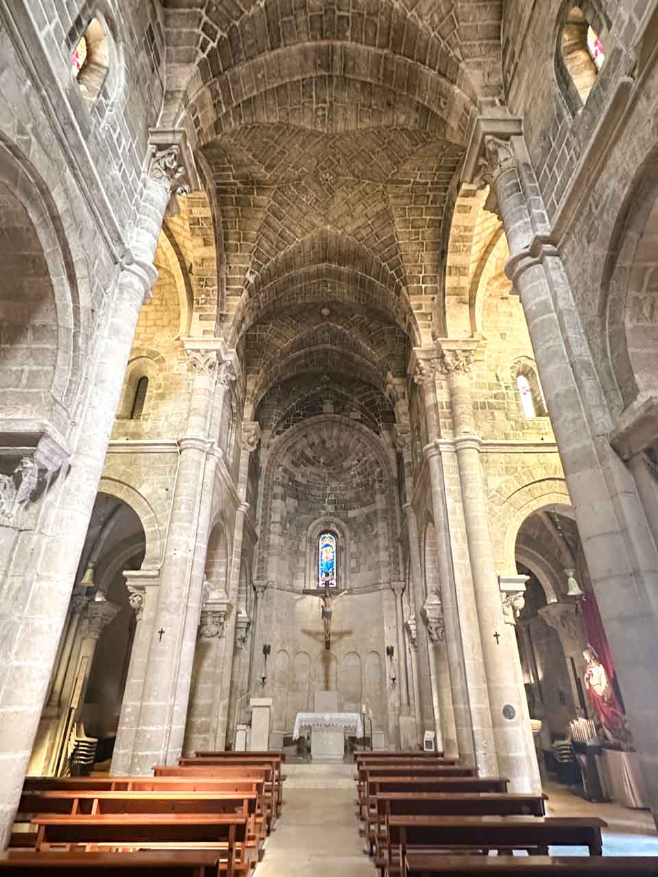 The nave and stone vaulted ceiling inside the Church of Saint John the Baptist in Matera