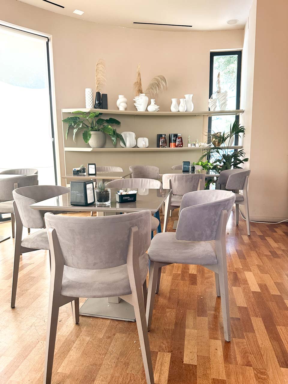 Tables and shelves inside Di Bitonto in Matera