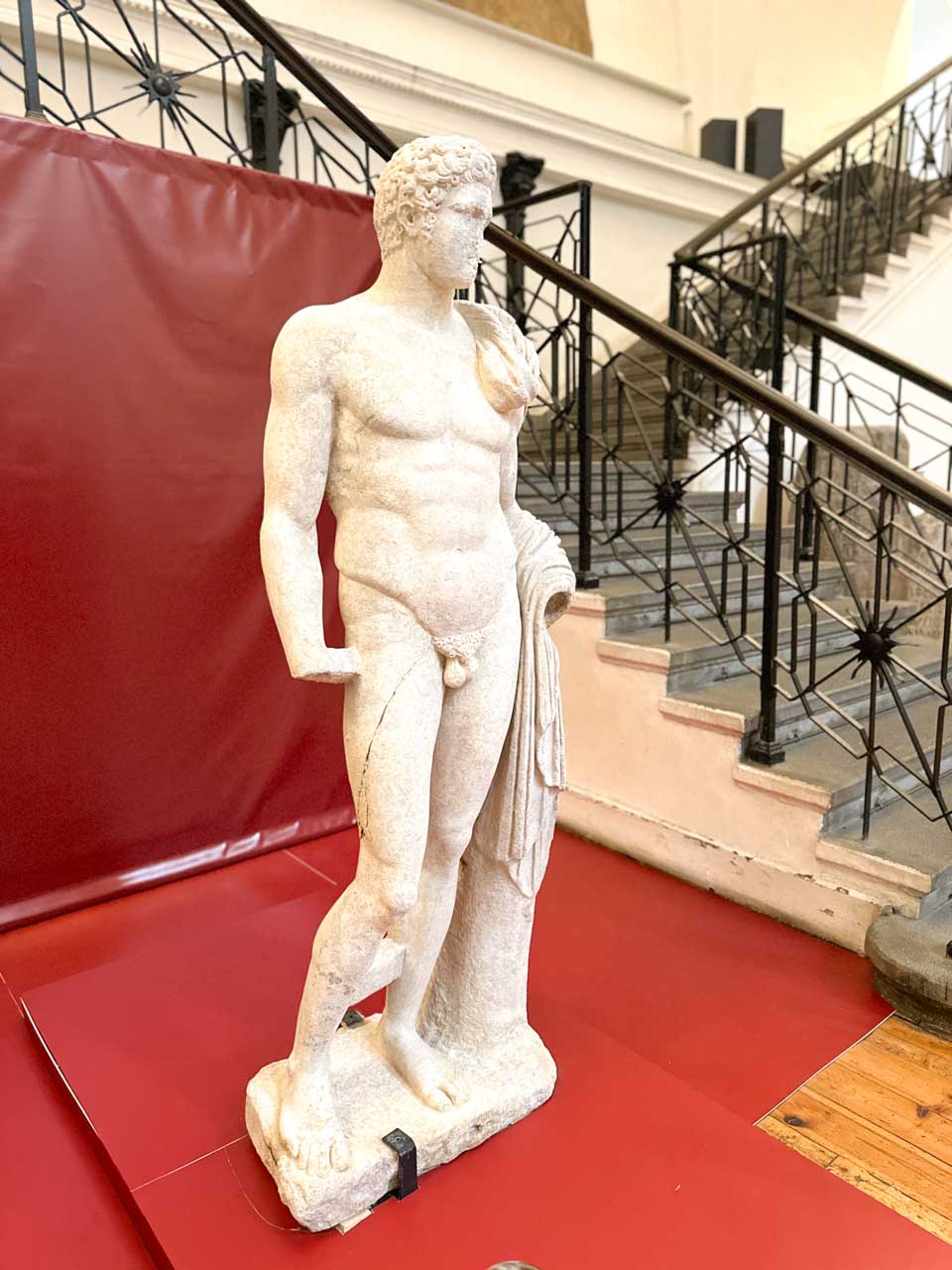 Ancient marble statue of a man displayed at the National Archaeological Museum in Sofia