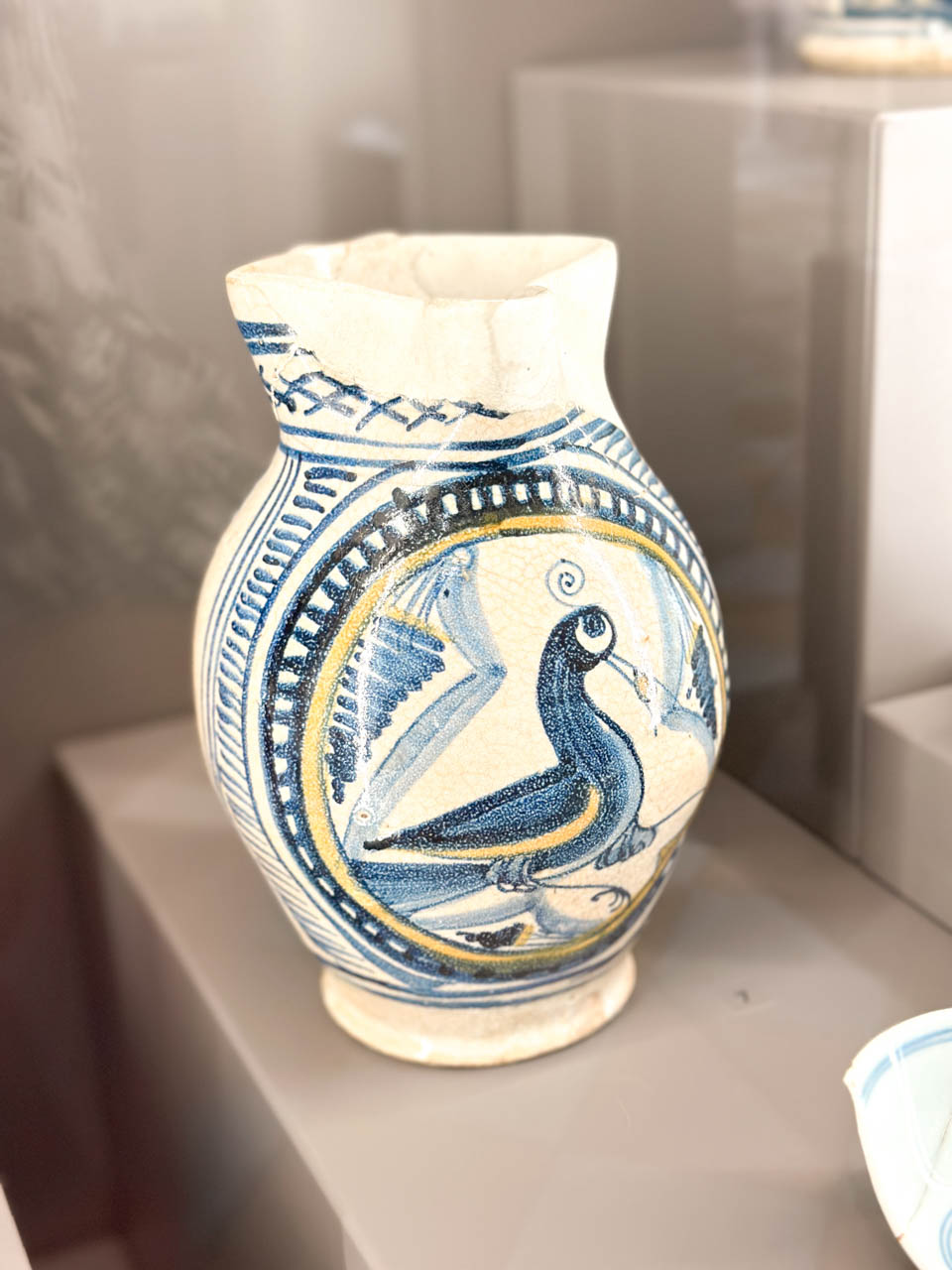Decorated ceramic jug with a bird design displayed at the Regional History Museum in Sofia