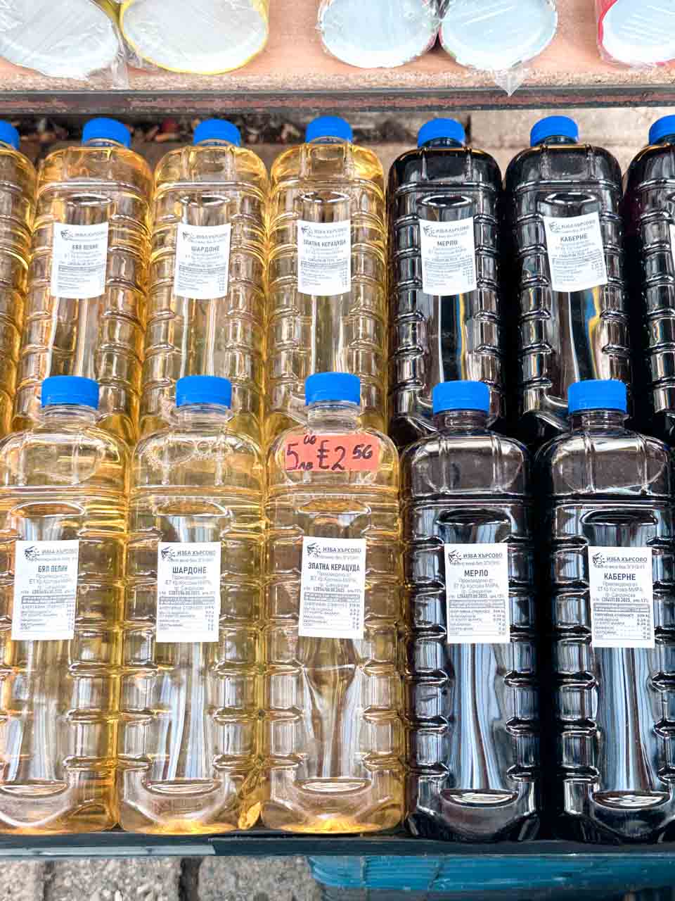 Plastic bottles of Bulgarian wine for sale at the Zhenski Pazar - Women&rsquo;s Market in Sofia
