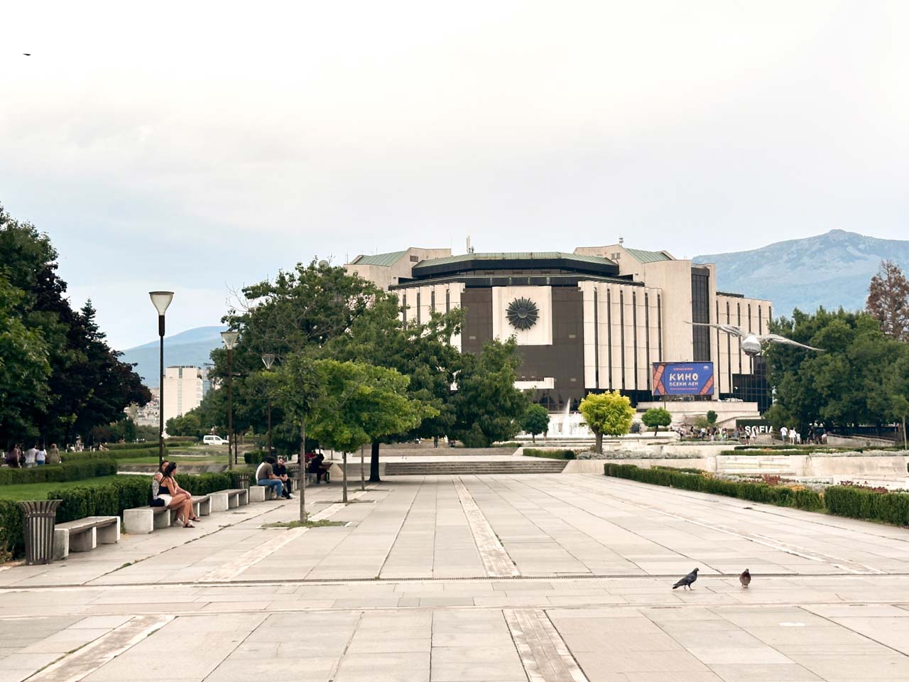 National Palace of Culture in Sofia, with fountains and Vitosha Mountain in the background