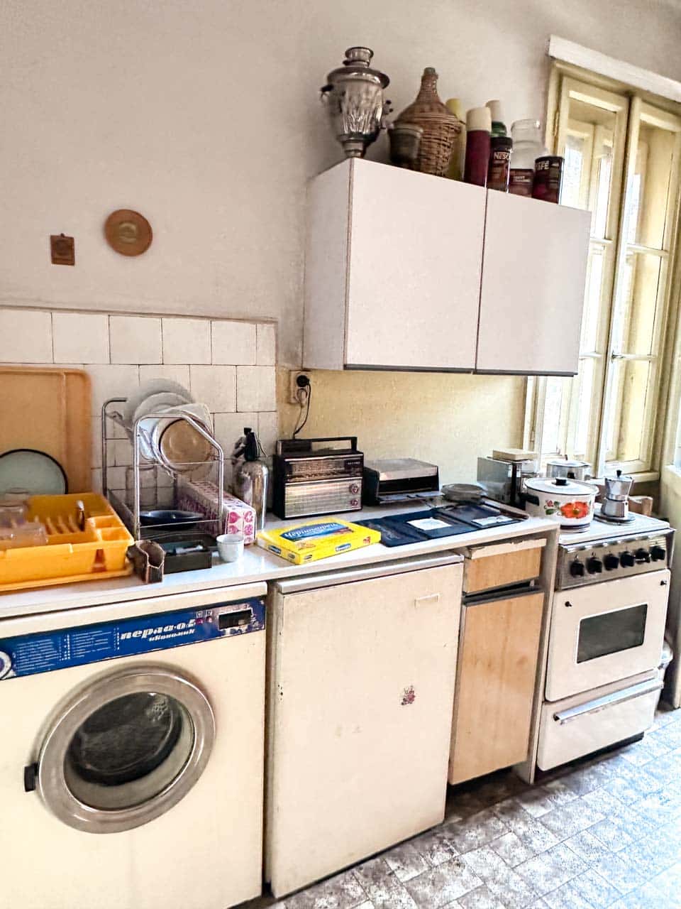 Vintage kitchen with retro appliances and cookware at the Red Flat museum in Sofia, Bulgaria