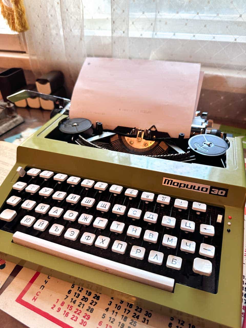 Close-up of a vintage Bulgarian typewriter at the Red Flat museum in Sofia, Bulgaria