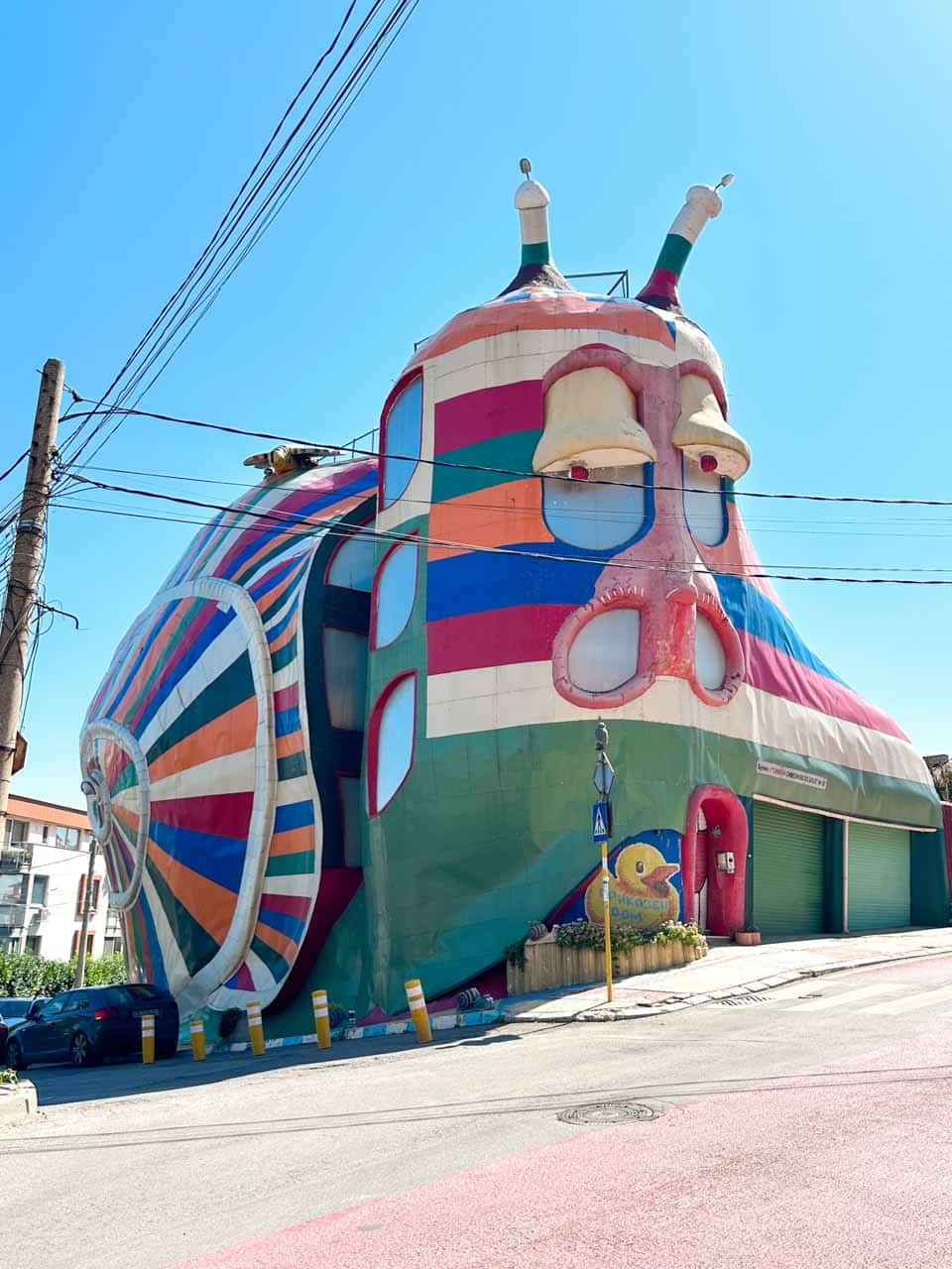 Colourful Snail House with its distinctive striped facade in Sofia, Bulgaria