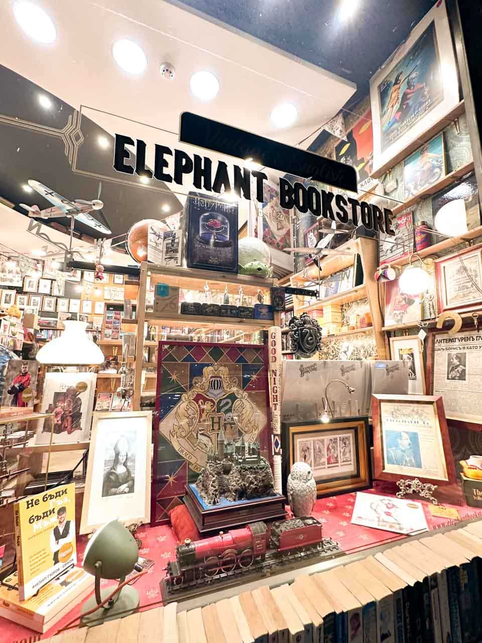 Colourful interior of Elephant Bookstore in Sofia filled with books, artwork, and quirky memorabilia