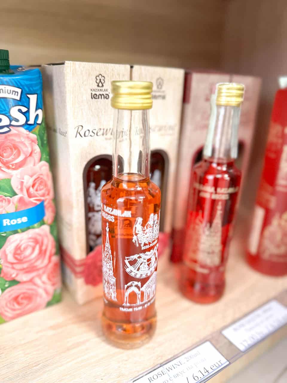 Bottles of Bulgarian rose wine and rose products displayed at the One Bulgarian Rose shop in Sofia