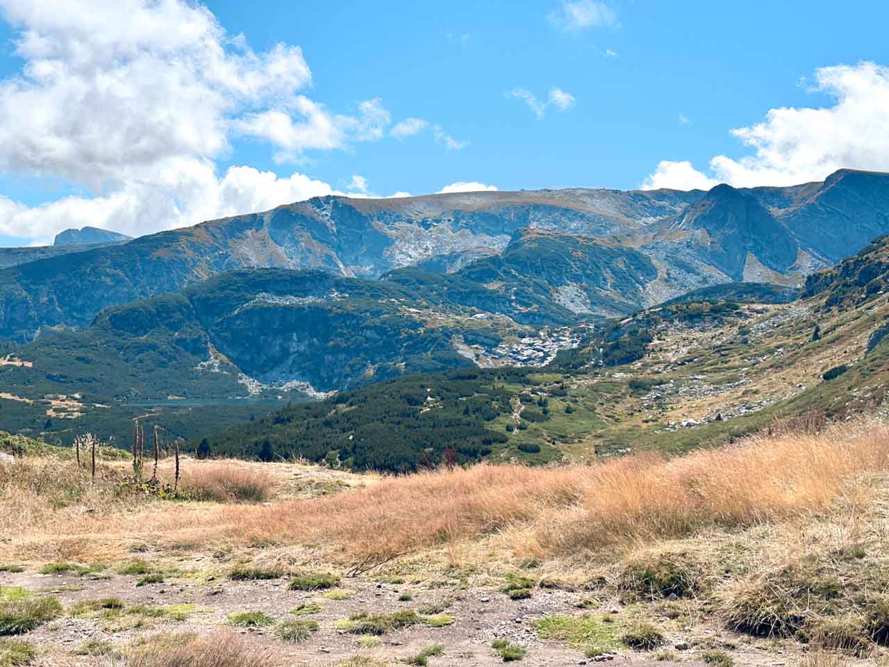Panoramic view of mountain peaks and alpine landscape in the Rila Mountains in Bulgaria