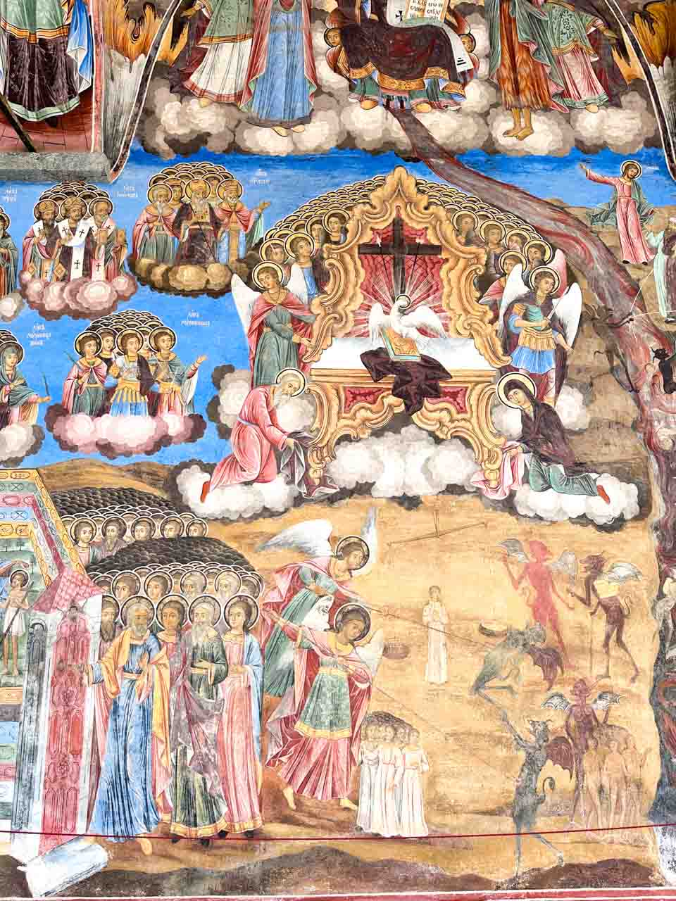 Detailed Orthodox fresco showing angels and saints outside the church at Rila Monastery in Bulgaria