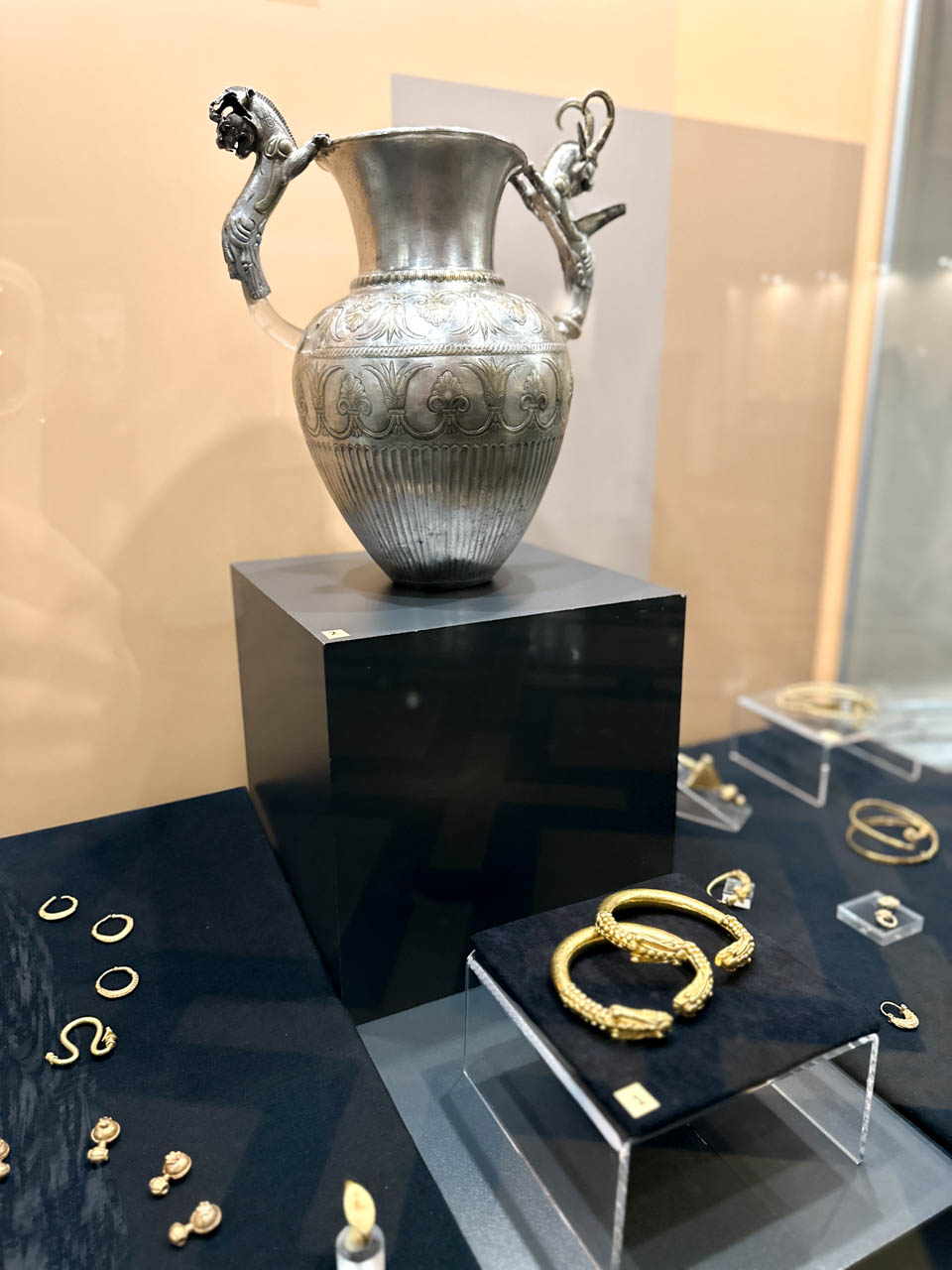 Ornate silver vessel and gold jewellery displayed inside the National Archaeological Museum in Sofia