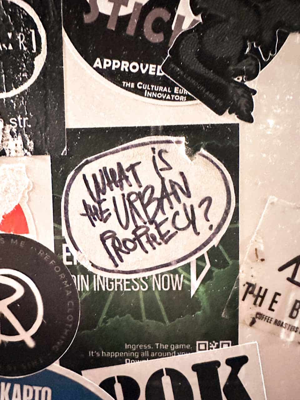 A wall covered in stickers at Skapto in Sofia, including one asking &ldquo;What is the urban prophecy?&rdquo;