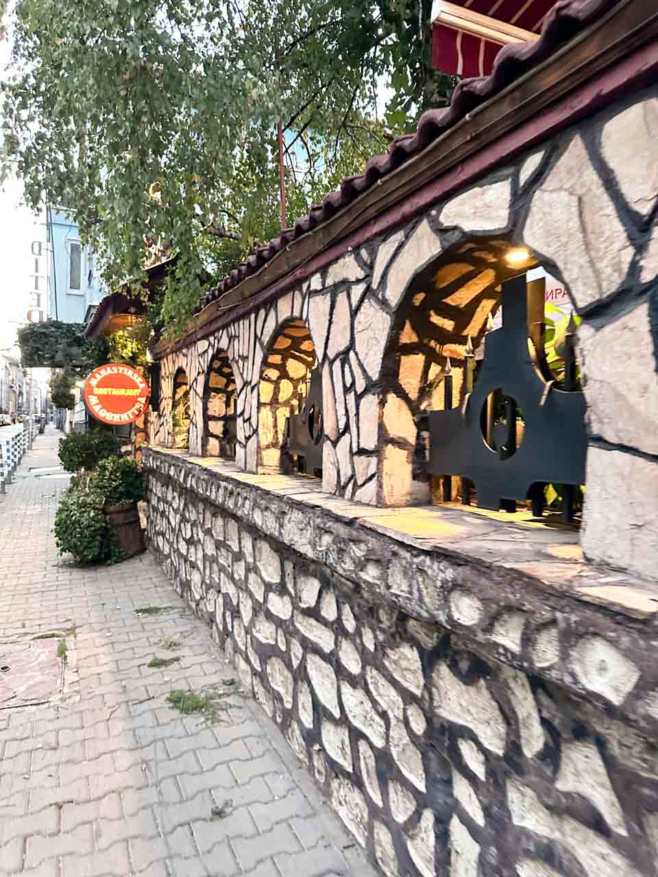 Stone exterior of Manastirska Magernitsa, a traditional Bulgarian restaurant in Sofia, Bulgaria