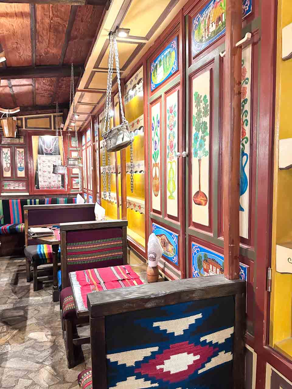 Colourful traditional Bulgarian interior at Hadjidraganov's Cellars Restaurant in Sofia