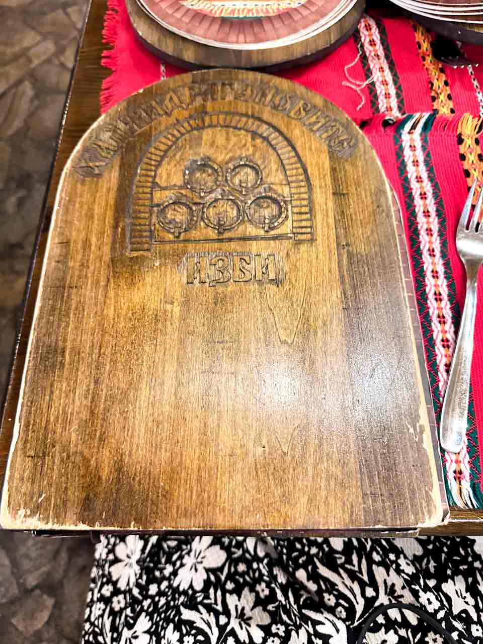 Wooden menu at Hadjidraganov's Cellars Restaurant in Sofia, Bulgaria
