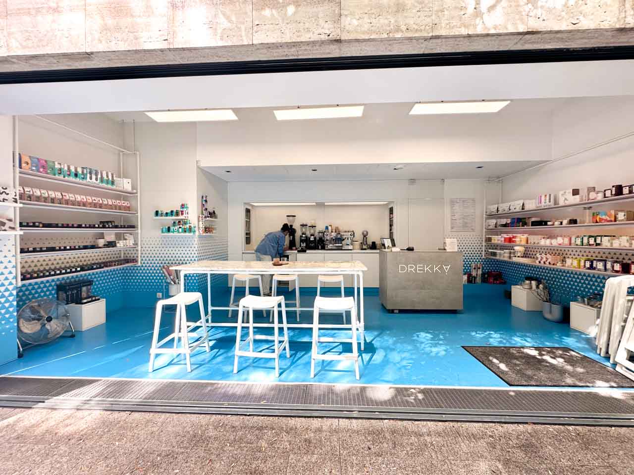 Bright blue and white interior of Drekka coffee shop in Sofia, Bulgaria