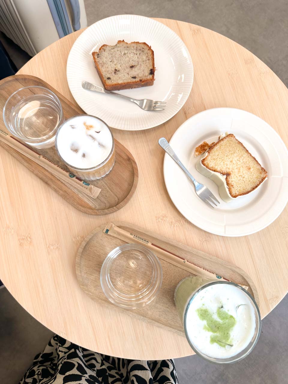 Banana bread and lemon loaf served with iced coffee and matcha at Bloom Specialty Coffee in Sofia